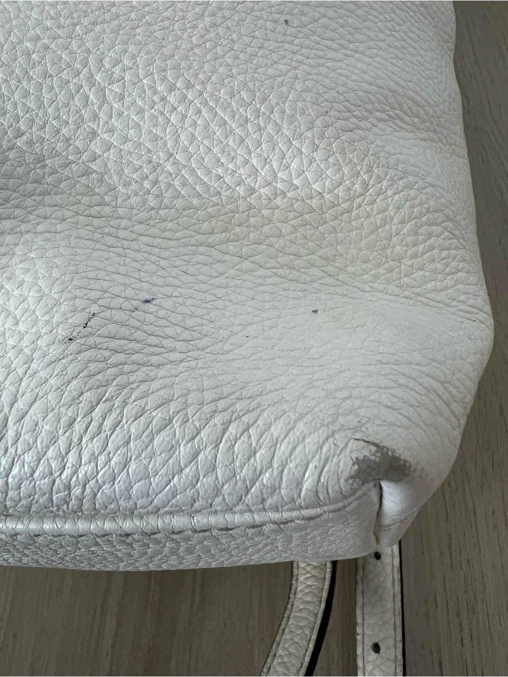 Kate Spade New York creamy white leather drawstring flap backpack